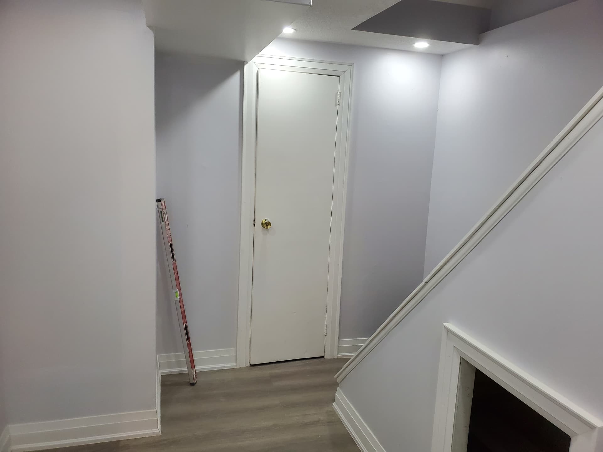 Finished hallway with new doors, trim and LVP flooring