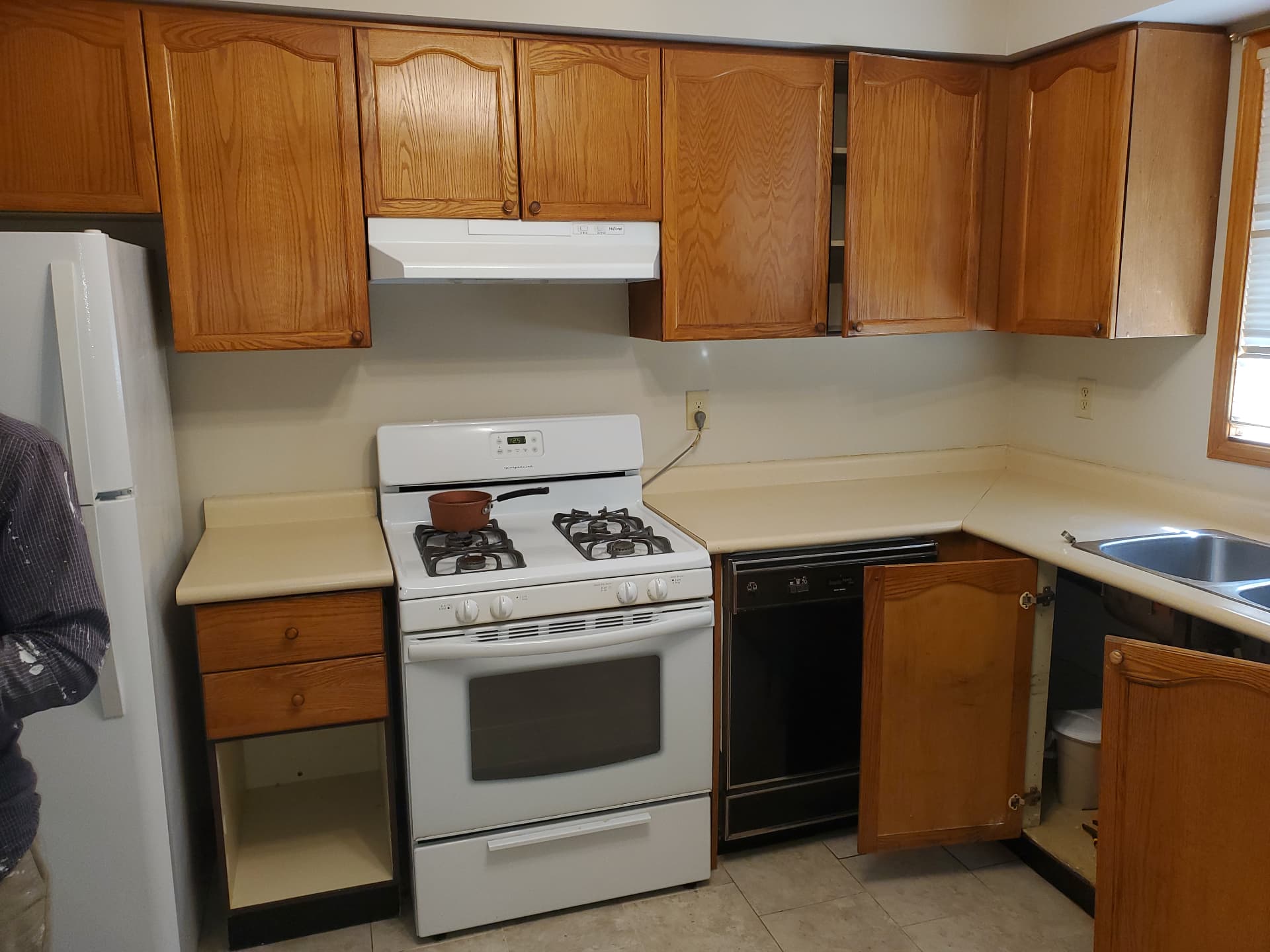 Existing kitchen layout and appliances before transformation