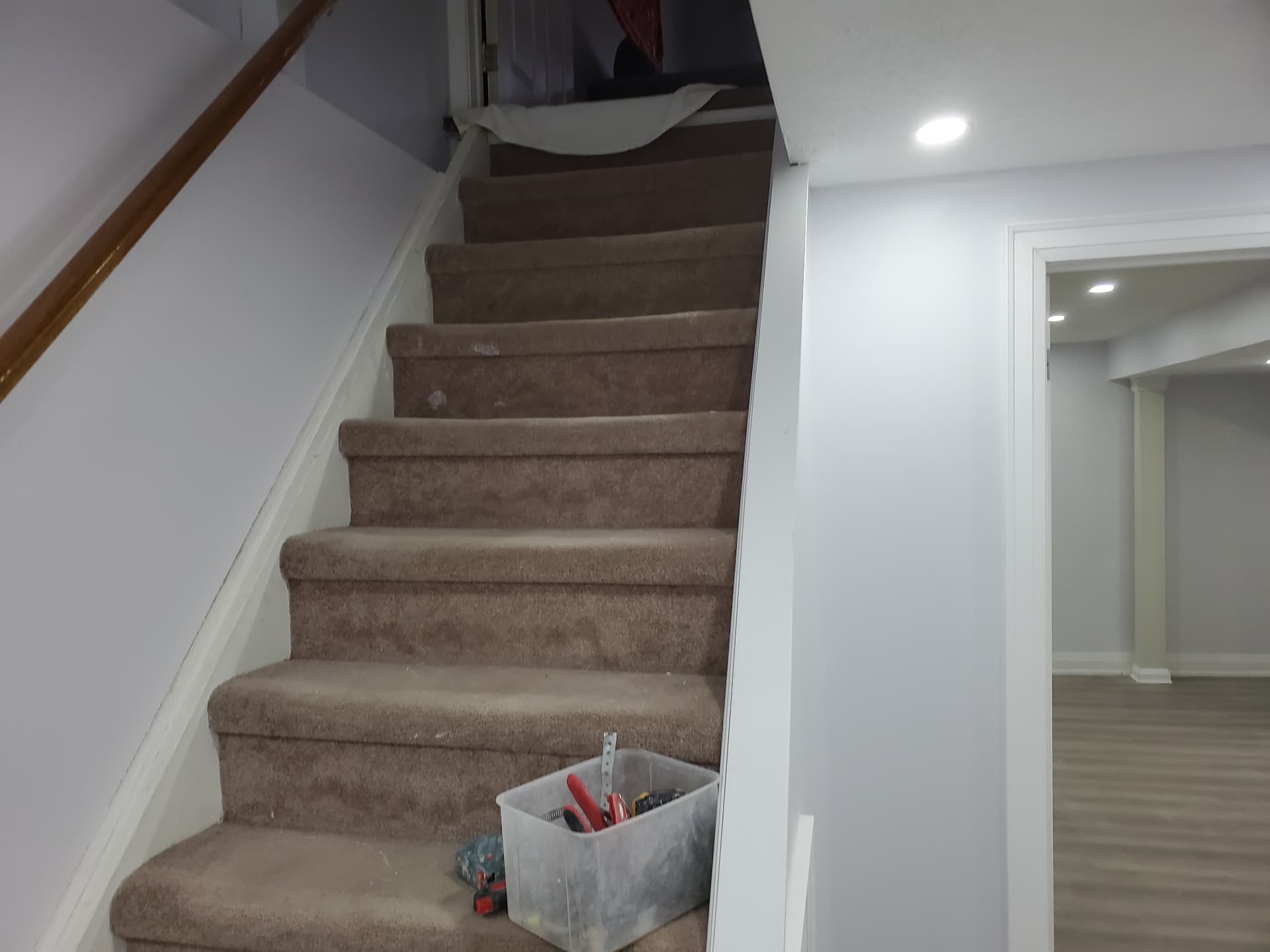 Finished staircase leading to the renovated basement