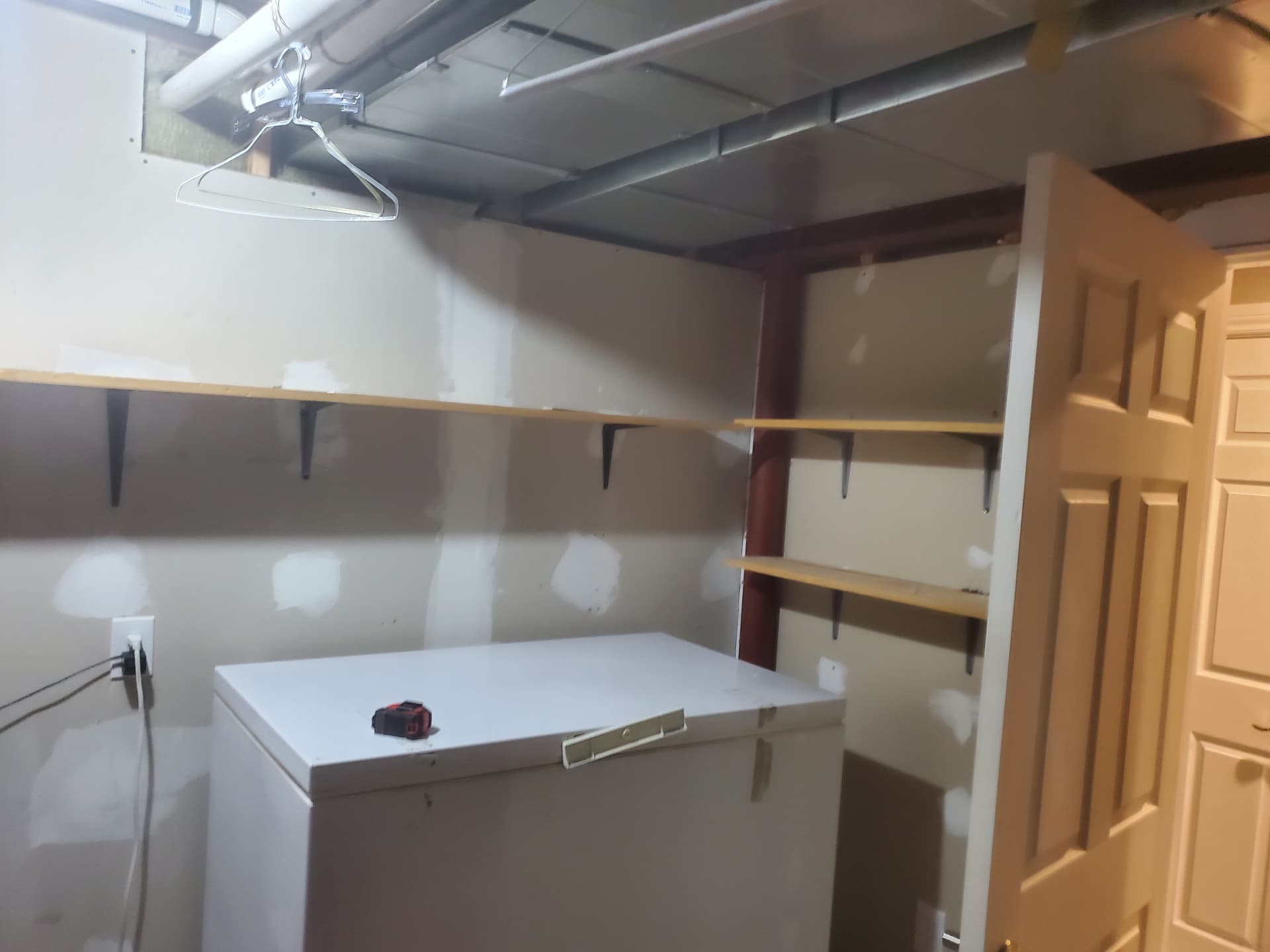 Basement storage room prior to demolition